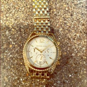 MK gold tone watch